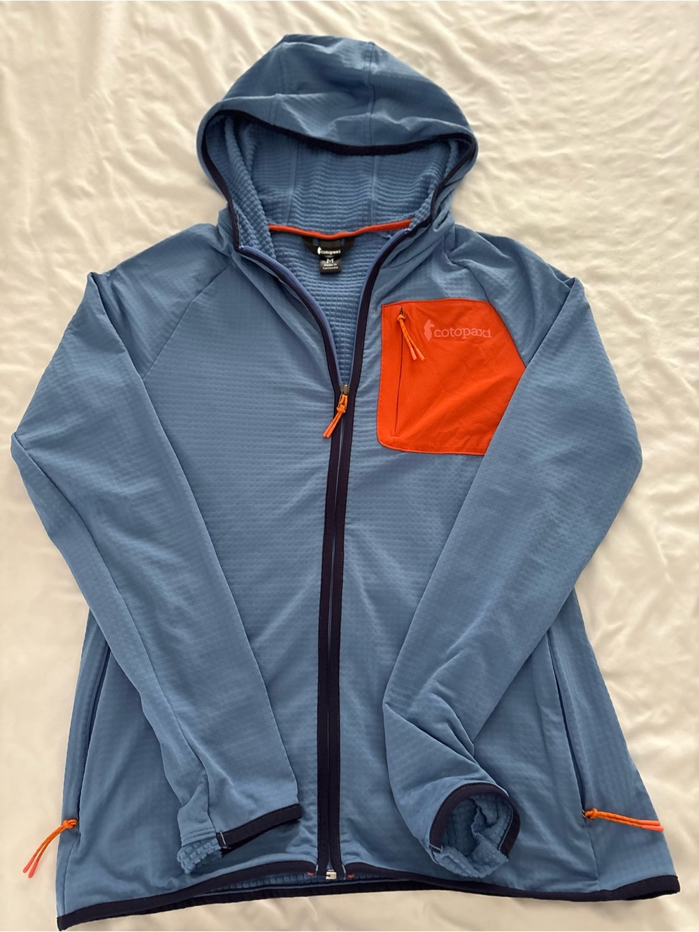 Cotopaxi Otero Fleeve Blue Hooded Jacket with Orange Chest Pocket